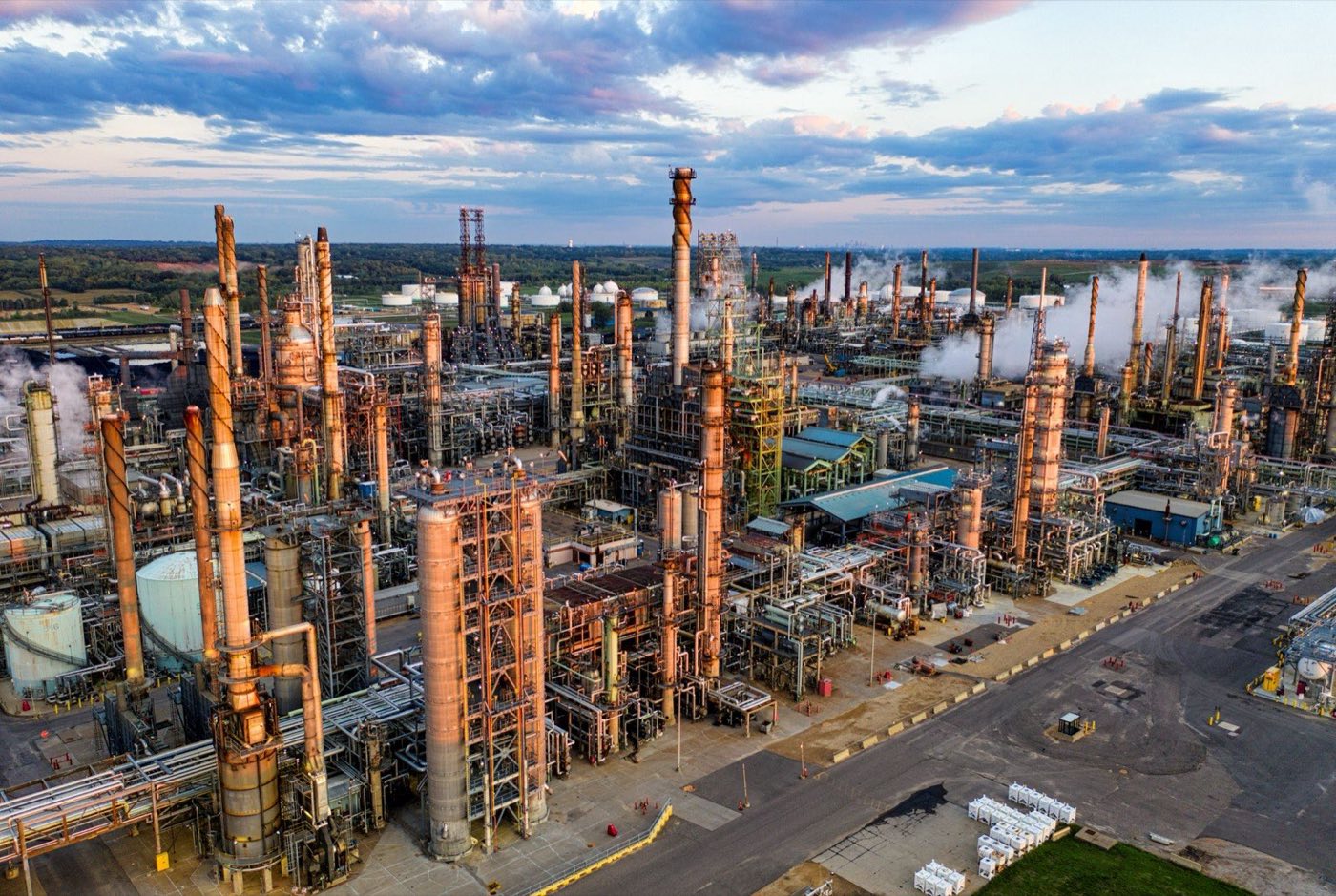 Aerial view of a refinery at dusk